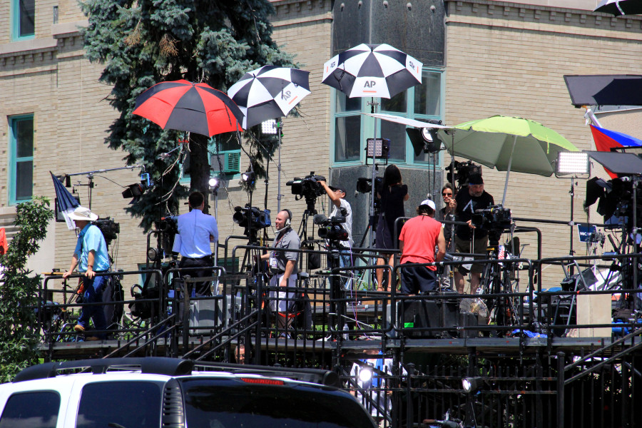 Broadcast media camp out on risers across the street from the Cuban Embassy in Washington on July 20, 2015. (Jennifer-Leigh Oprihory/MEDILL NSJI)