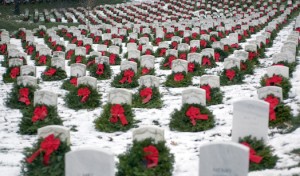 Photo by Master Sgt. Jim Varhegyi, U.S. Air Force. Wreaths at graves at Arlington National Cemetery. This iconic photo helped establish Wreaths Across America as a national non-profit organization.