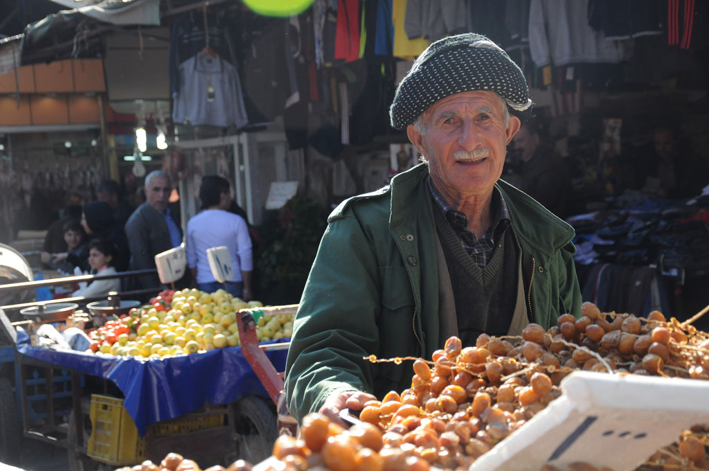 A man selling dates at the market in Sulaymaniyah. Alix Hines/MEDILL