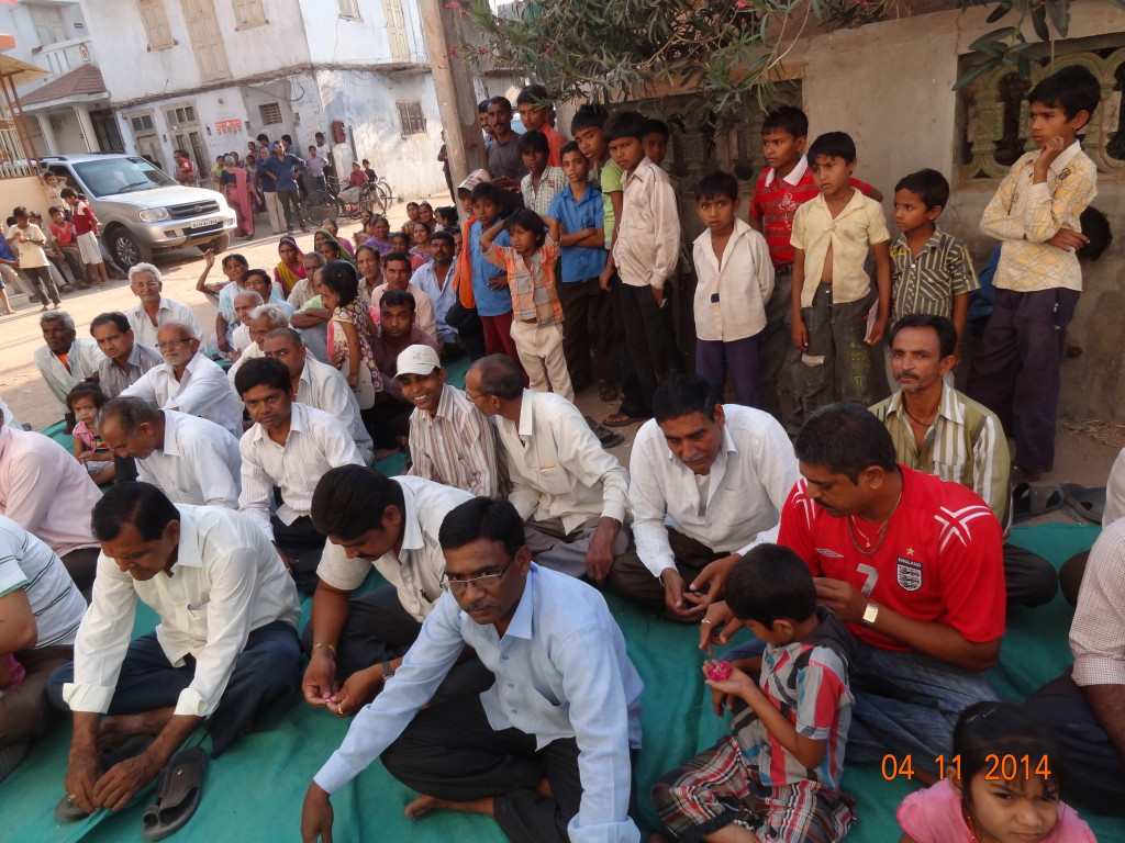 Villagers from the Indian state of Gujarat listen to a local candidate before going to the polls. Photo courtesy of Dr. Bharat Barai. 