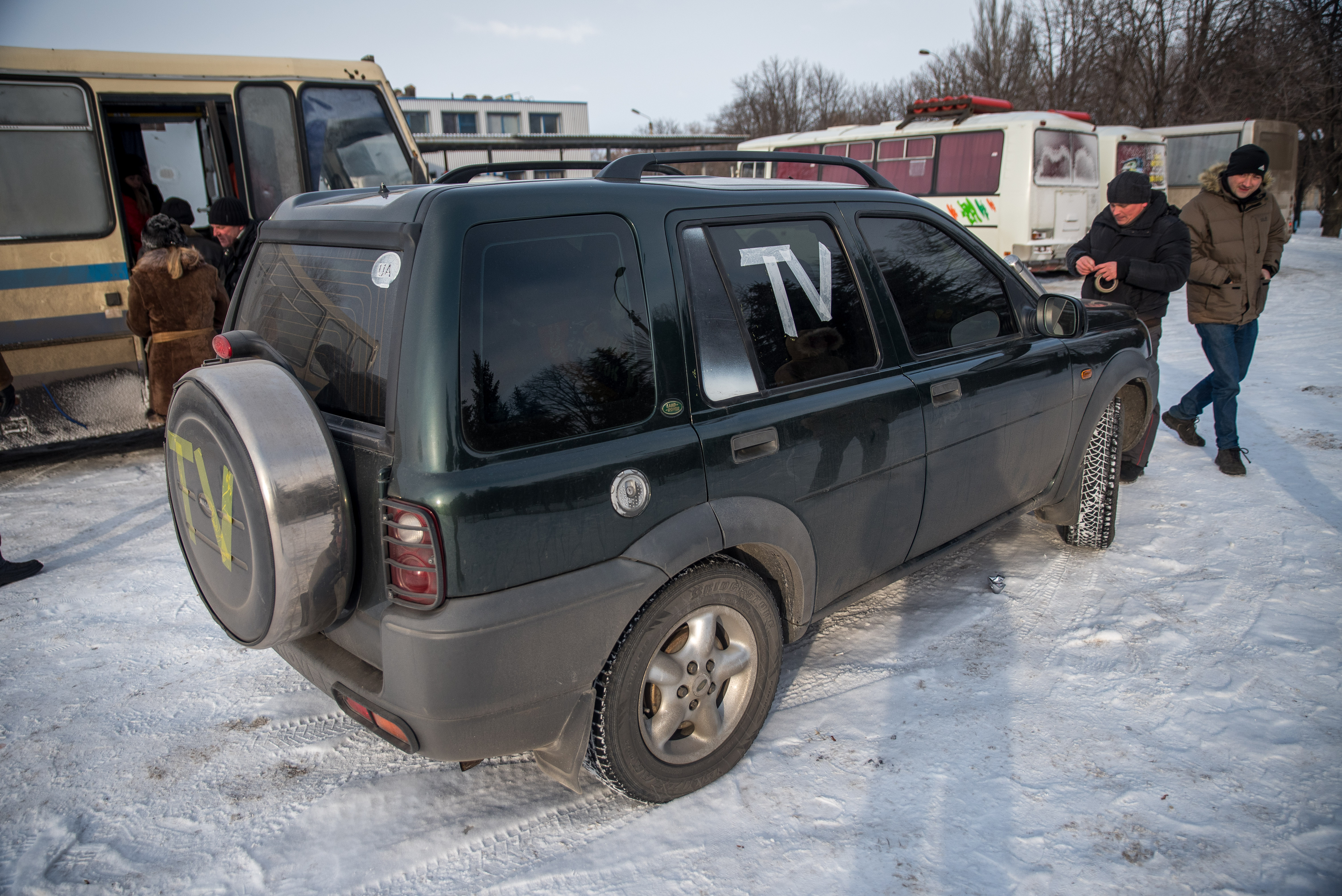 1/9: The car I took from Kyiv to Debaltseve on my second trip to the front lines. Note the TV sticker on the spare tire and passenger window. (Photo Credit: James Sprankle)