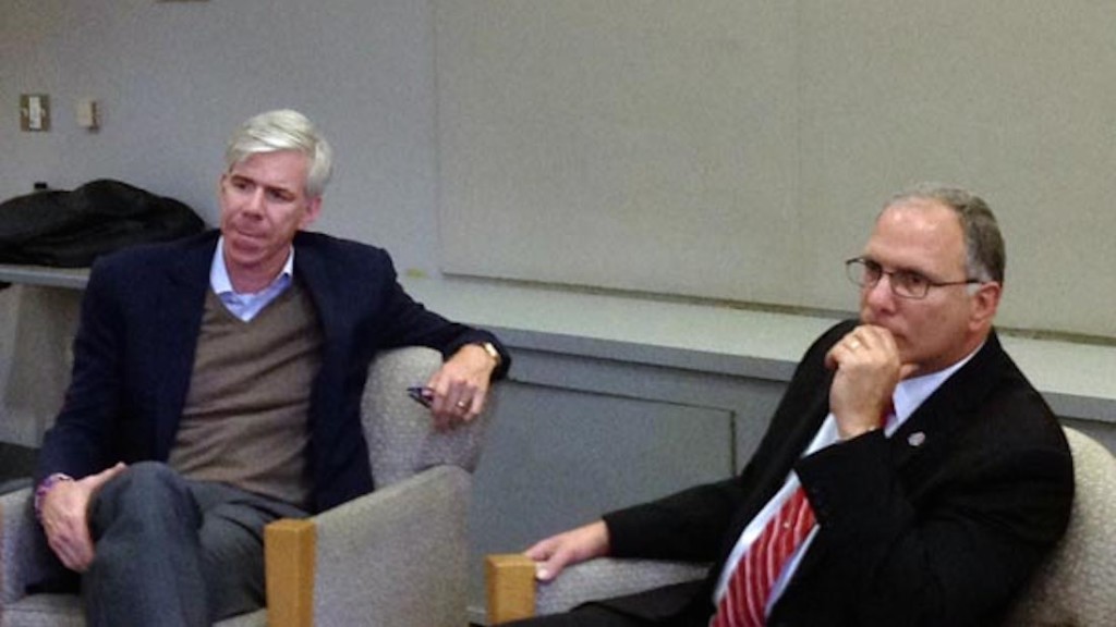 David Gregory (left) moderates a discussion concerning the rise of ISIS with retired Army Col. Peter Mansoor at American University on Wednesday, April 8. Mansoor said that the takeover of ISIS is a direct result of the U.S. decision to invade, and then leave Iraq in the 2000s: “Al-Qaida was defeated during the surge in 2007-2008 – not destroyed.” (Mary Cirincione/MEDILL)